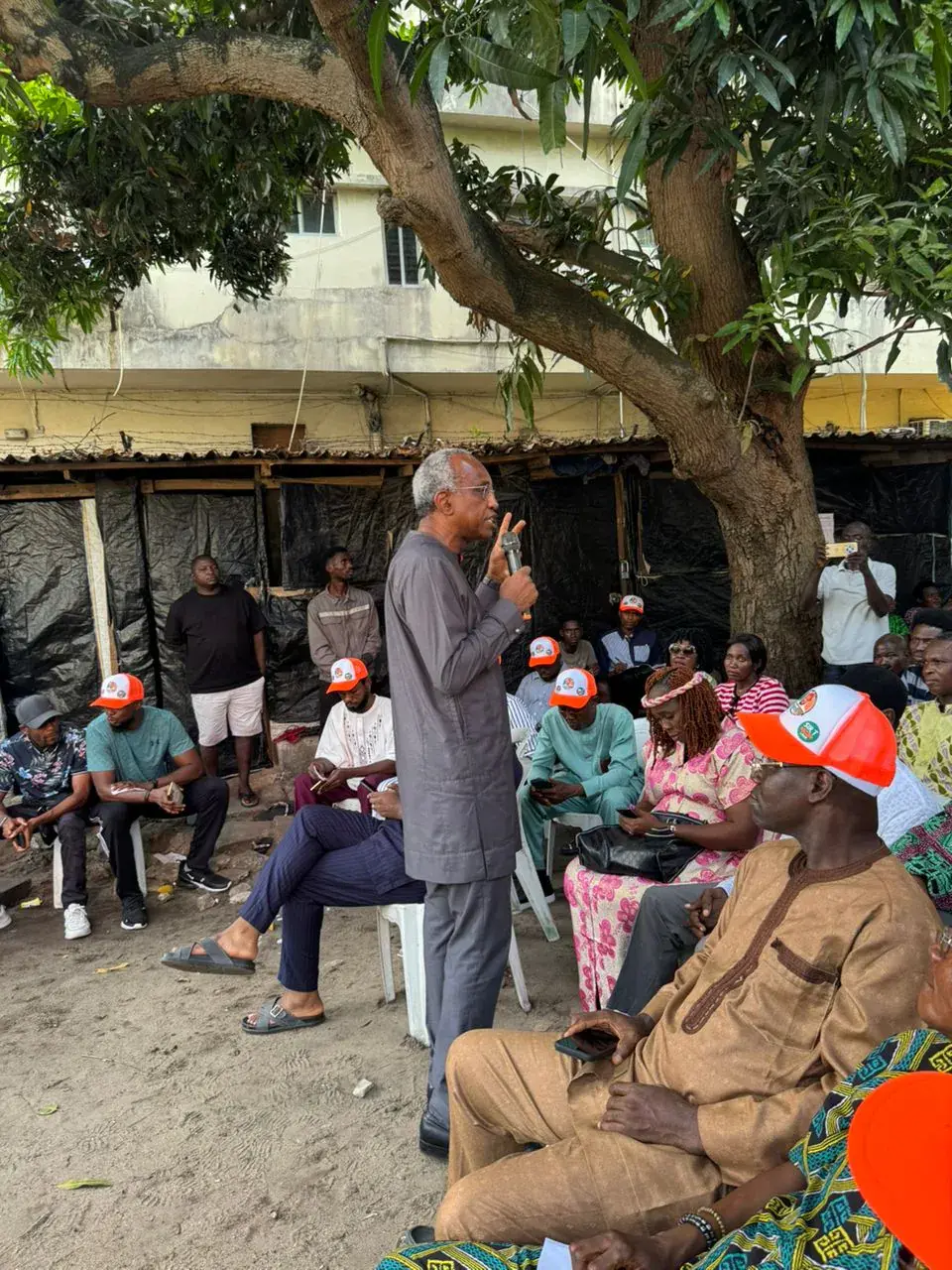 Funso Doherty with people during his visit to Eti-Osa.
